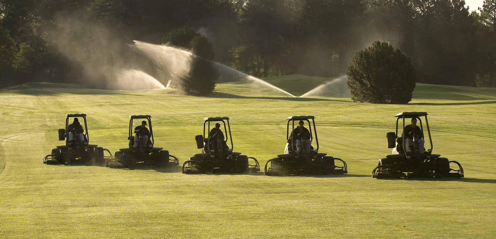 Golf fairway mowing equipment.