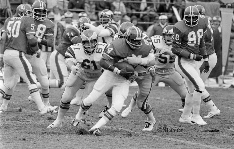 Floyd Little carries the ball during his last home game at Mile High Stadium, Denver, Colorado.